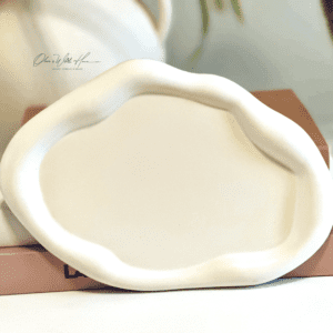 A white plate sitting on top of a table.