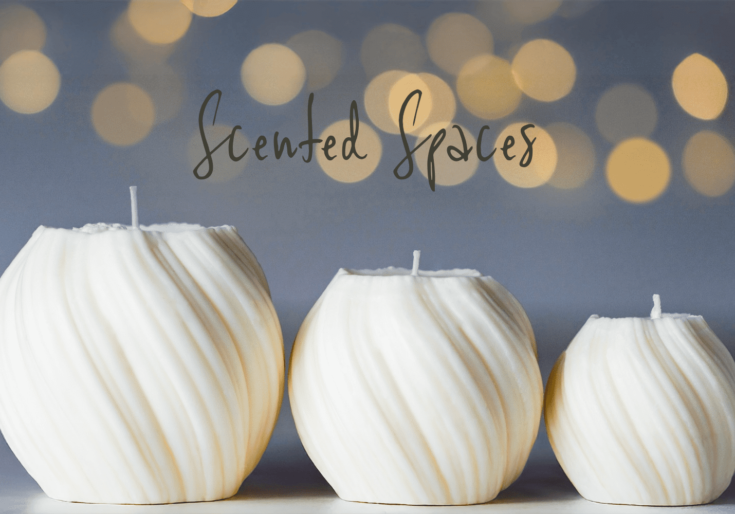 Three white candles with blurred lights background.